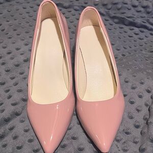 Beautiful light pink heels. Never been worn. Size 6 in American size 35 European
